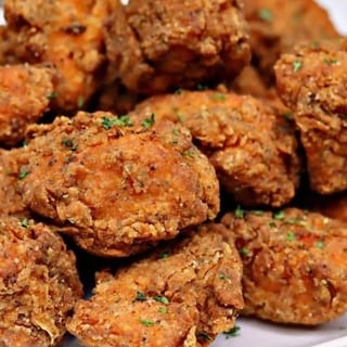 Crispy Salmon Bites served with 2 sides, honey cornbread & Beverage! $18.99